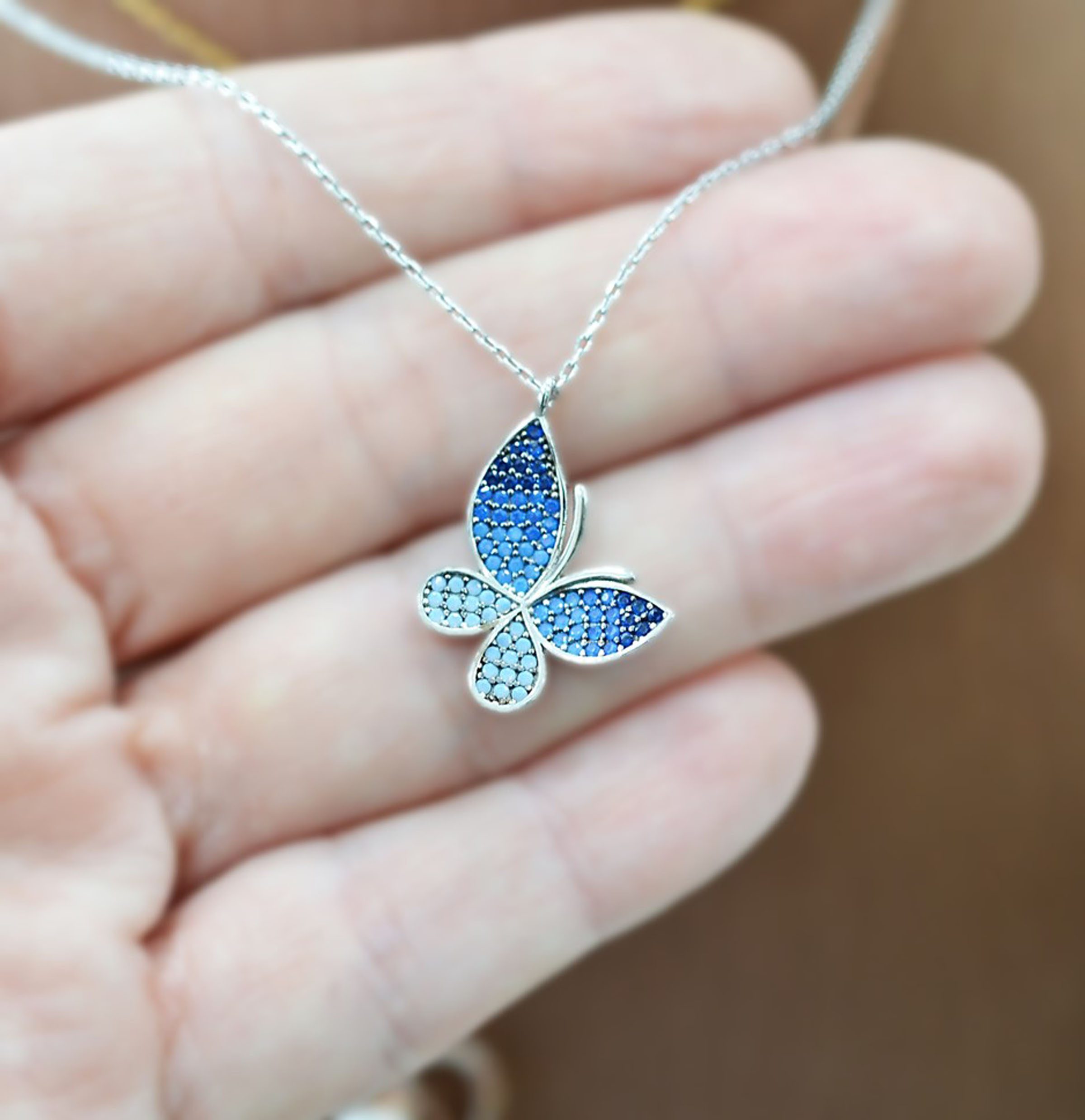 TL08-N88266-ashmenio-kolie2 Ασημένιο κολιέ 925° με μοτίφ πεταλούδα με πέτρες.