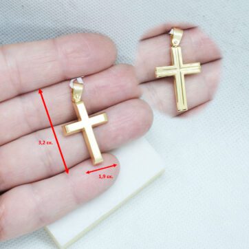 Χρυσός βαπτιστικός σταυρός διπλής όψης με ανάλυφα σχέδια απο την μια πλευρά μαζί με αλυσίδα.