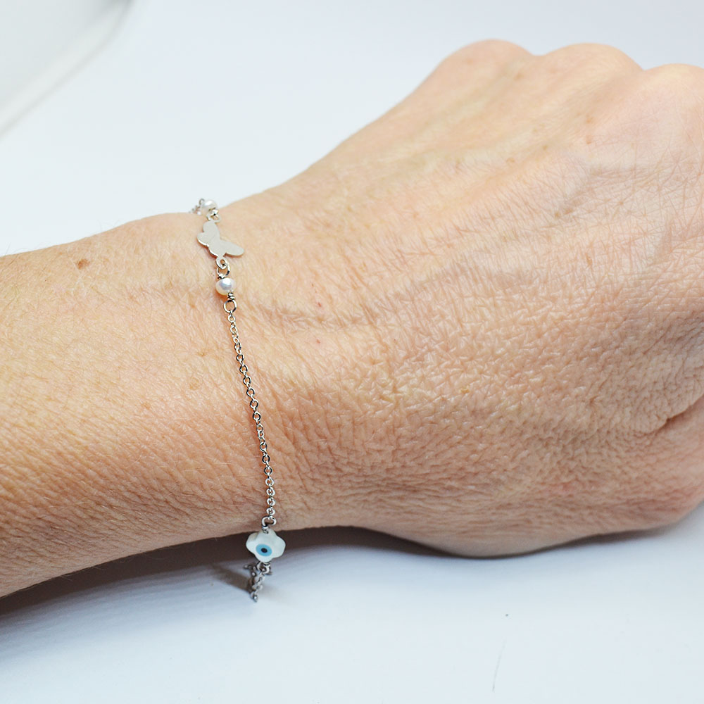 BR19859-leukoxruso-vraxioli2 Λευκόχρυση αλυσίδα χεριού με μοτίφ πεταλούδα και ματάκι.